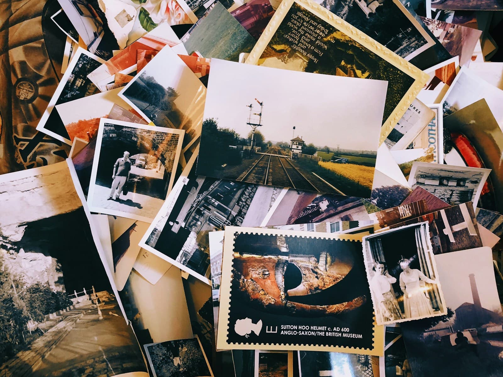 A pile of scattered printed photos